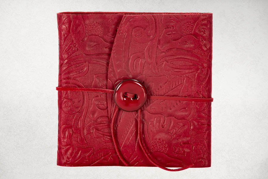 Tooled red leather wrap albums